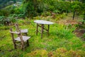Handmade rustric table and chairs Royalty Free Stock Photo
