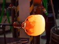 Handmade shaping of melted glass, selective focus Royalty Free Stock Photo