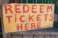Handmade Sign Instructs Carnival Patrons Where To Redeem Tickets