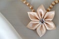 Handmade silk fabric flower as a pendant