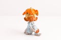 Handmade sitting elf figurine in white and orange