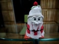 Handmade small statue of Santa Claus for home decoration on the Christmas. Cute old hand made santa with copy space.