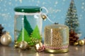 Handmade snow globes and Christmas decorations on table