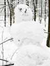 Handmade snowman closeup in snow-covered city park Royalty Free Stock Photo