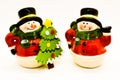 Handmade snowmen figurines isolated on white background. Christmas decoration.