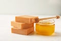 Handmade soap bars and jar of honey Royalty Free Stock Photo