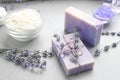 Handmade soap bars with lavender flowers on grey stone Royalty Free Stock Photo