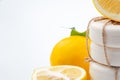 Handmade soap bars and lemon on white background. Royalty Free Stock Photo