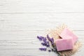 Handmade soap bars, oatmeal and lavender on white wooden background Royalty Free Stock Photo