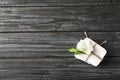 Handmade soap bars with orchid on wooden background, top view Royalty Free Stock Photo