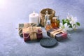 Handmade soap with different spa products on the table