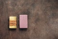 Handmade soap, herbal and lavender on a dark brown rustic background. Top view, flat lay, copy space