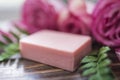 Handmade soap, roses and green leaves