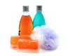 Handmade soap, two bottle of shower gel and soft bath puff or sponge. Royalty Free Stock Photo