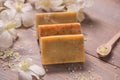 Handmade soap with white orchid. Spa products. Royalty Free Stock Photo