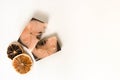 Flat lay composition with two handmade soaps of brown-pink color with an orange tint and dried slices of oranges on a Royalty Free Stock Photo