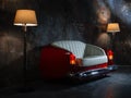 A handmade sofa and a lamp on a grunge style wall background. Made to order from the car seat. Royalty Free Stock Photo