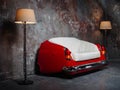 A handmade sofa and a lamp on a grunge style wall background. Made to order from the car seat. Royalty Free Stock Photo