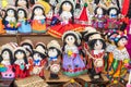 Handmade souvenir dolls in the traditional embroidered clothes, province of Azuay. Ecuador. Royalty Free Stock Photo