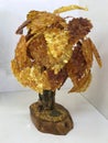 Handmade souvenir tree made of many small pieces of natural Baltic amber