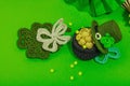 Handmade St. Patrick\'s Day concept. Traditional decorative symbols, pot with golden coins Royalty Free Stock Photo