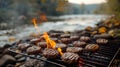 Handmade stone grill by the riverbank with delicious burgers sizzling on the grid