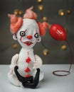 Handmade toy from movie It, Pennywise the dancing clown, and red ball