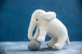 Handmade toy white elephant with gray stone Royalty Free Stock Photo