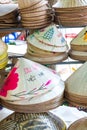 Handmade traditional Vietnamese leaf hats for sale in a market Hoi An, Vietnam, Asia Royalty Free Stock Photo