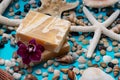 Handmade ultra-moisturizing Almond Scented Goat`s Milk Bar Soap decorated with Pebbles, Sea Stars, Sea Shells and Orchid Flower