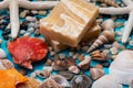 Handmade ultra-moisturizing Almond Scented Goat`s Milk Bar Soap decorated with small Pebbles, Sea Stars and Sea Shells