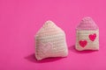 Handmade Valentines Day concept. Creative house figurines, traditional hearts, spring crocheting