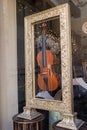 Handmade Violin inserted inside a Golden Frame