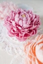 Handmade wax candle in the shape of a pink peony flower Royalty Free Stock Photo