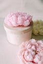 Handmade wax candle in the shape of a pink peony flower Royalty Free Stock Photo