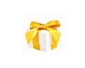 Handmade white paper box with yellow gold satin ribbon and bow on an isolated white background Royalty Free Stock Photo