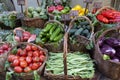 Handmade wicker baskets with tomatoes, lettuces, artichokes, peppers, cucumbers, eggplants and beans Royalty Free Stock Photo