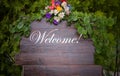 Handmade wooden board with welcome sign. Royalty Free Stock Photo