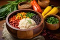 handmade wooden bowl holding rice, beans, and colorful veggies Royalty Free Stock Photo