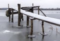 Handmade wooden pier on the river bank