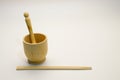 Handmade wooden pusher for spice and oriental sticks from light wood for sushi