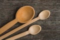 Handmade wooden spoons on a wooden board, kitchen tools Royalty Free Stock Photo