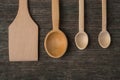 Handmade wooden spoons on a wooden board, kitchen tools Royalty Free Stock Photo