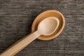 Handmade wooden spoons on a wooden board, kitchen tools Royalty Free Stock Photo