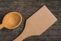 Handmade wooden spoons on a wooden board, kitchen tools Royalty Free Stock Photo