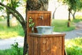 Handmade wooden Wash basin with soap in garden for hands cleaning in summer. Hand outdoor washing facilities to prevent the spread Royalty Free Stock Photo