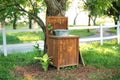 Handmade wooden Wash basin with soap in garden for hands cleaning in summer. Hand outdoor washing facilities to prevent the spread Royalty Free Stock Photo