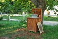 Handmade wooden Wash basin with soap in garden for hands cleaning in summer. Hand outdoor washing facilities to prevent the spread Royalty Free Stock Photo