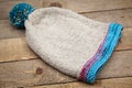 Handmade wool knitted winter blue and beige hat Royalty Free Stock Photo