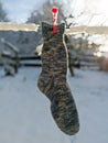 Handmade, wool socks on the clothesline Royalty Free Stock Photo